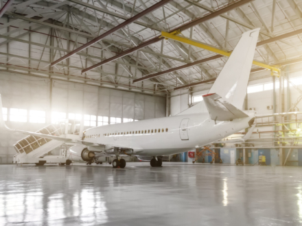 The,Airplane,In,The,Hangar,,Behind,The,Whole,Plane,And